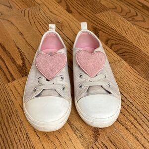 Slip on shoes with removable heart detail